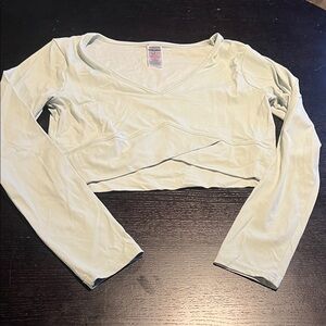 Gymshark cropped long sleeve top. Size M. Cute waist detail. Good used condition